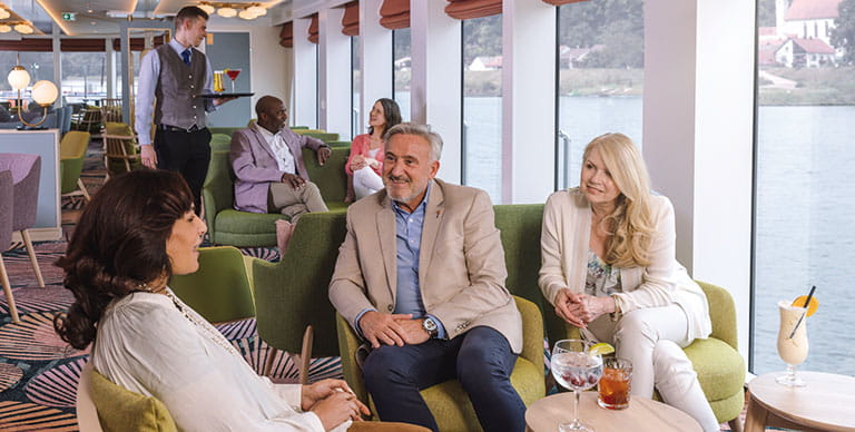 People in the Belvedere Lounge on Spirit of the Danube